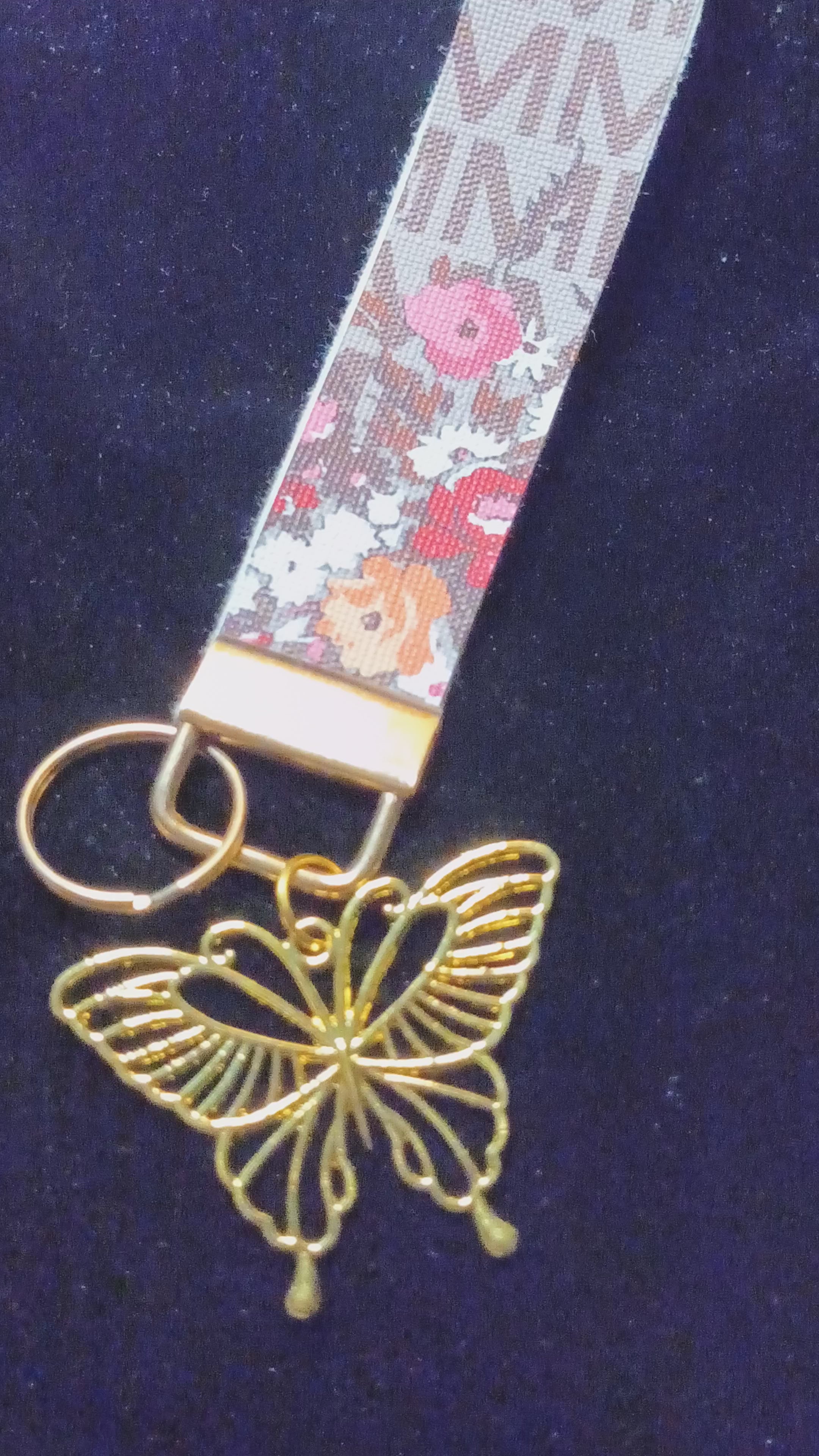 Beige Monogram Wristlet w/Gold Butterfly Charm