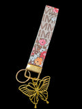 Beige Monogram Wristlet w/Gold Butterfly Charm